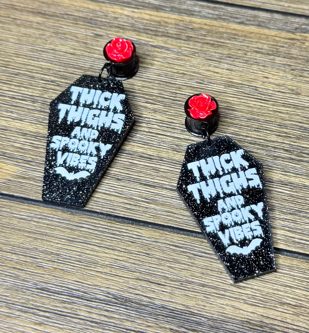 Thick Thighs & Spooky Vibes Glitter Coffin Dangle Ear Tunnels